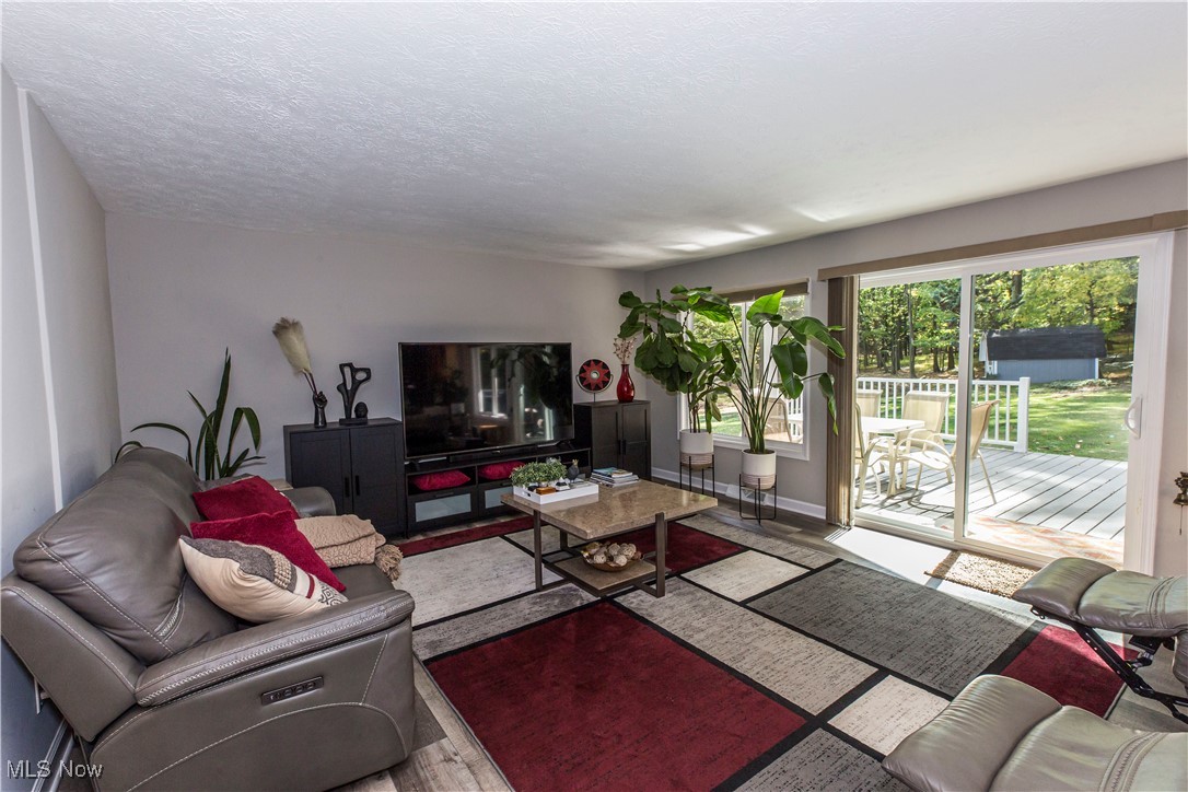2430 Rockside Road Independence, OH 44131 - Photo 12 of 46 Living room with a textured ceiling and baseboards