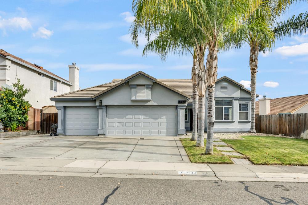 8430 O'Reilly Place Antelope, CA 95843 - Photo 1 of 1 a front view of a house with a garden and entryway
