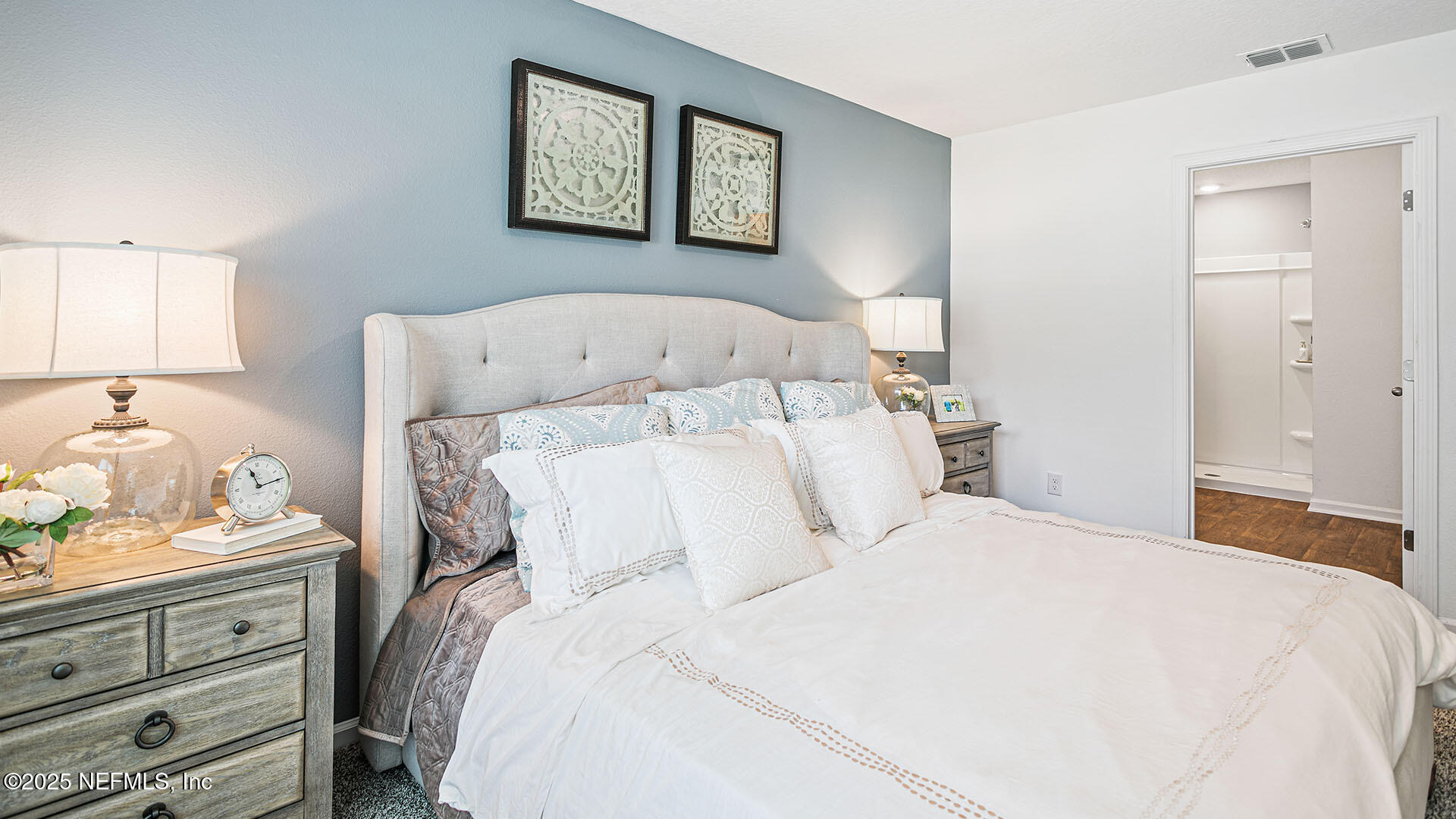 31 Palm Lane Palm Coast, FL 32164 - Photo 14 of 34 a bed room with a bed and a night stand