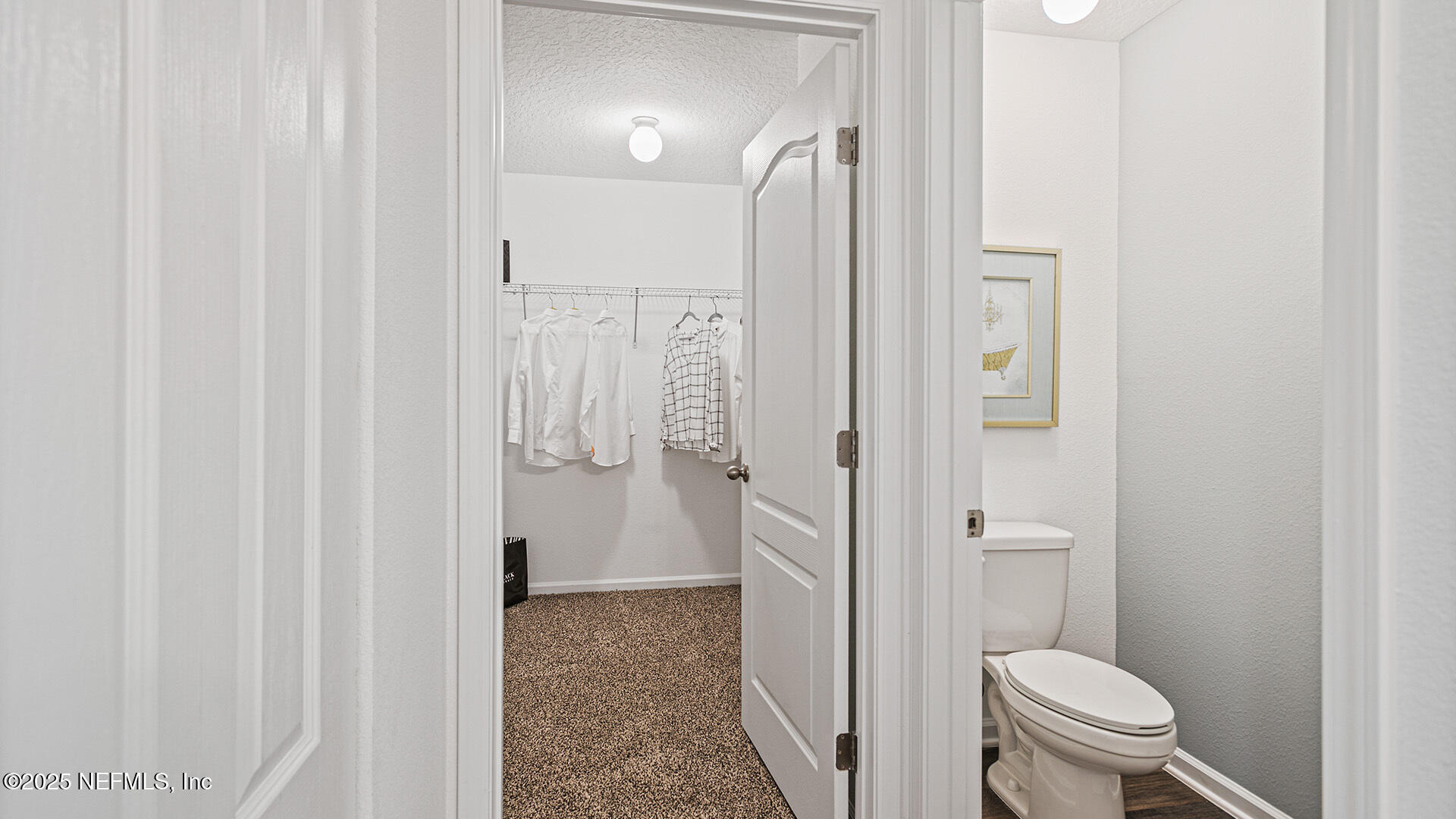 31 Palm Lane Palm Coast, FL 32164 - Photo 16 of 34 a bathroom with a granite countertop sink a toilet and shower