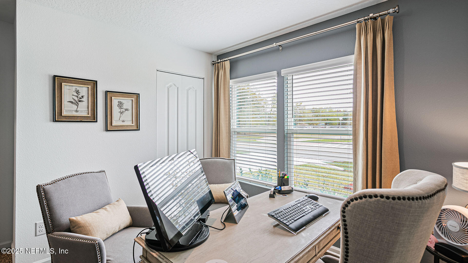 31 Palm Lane Palm Coast, FL 32164 - Photo 19 of 34 a living room with furniture and two window
