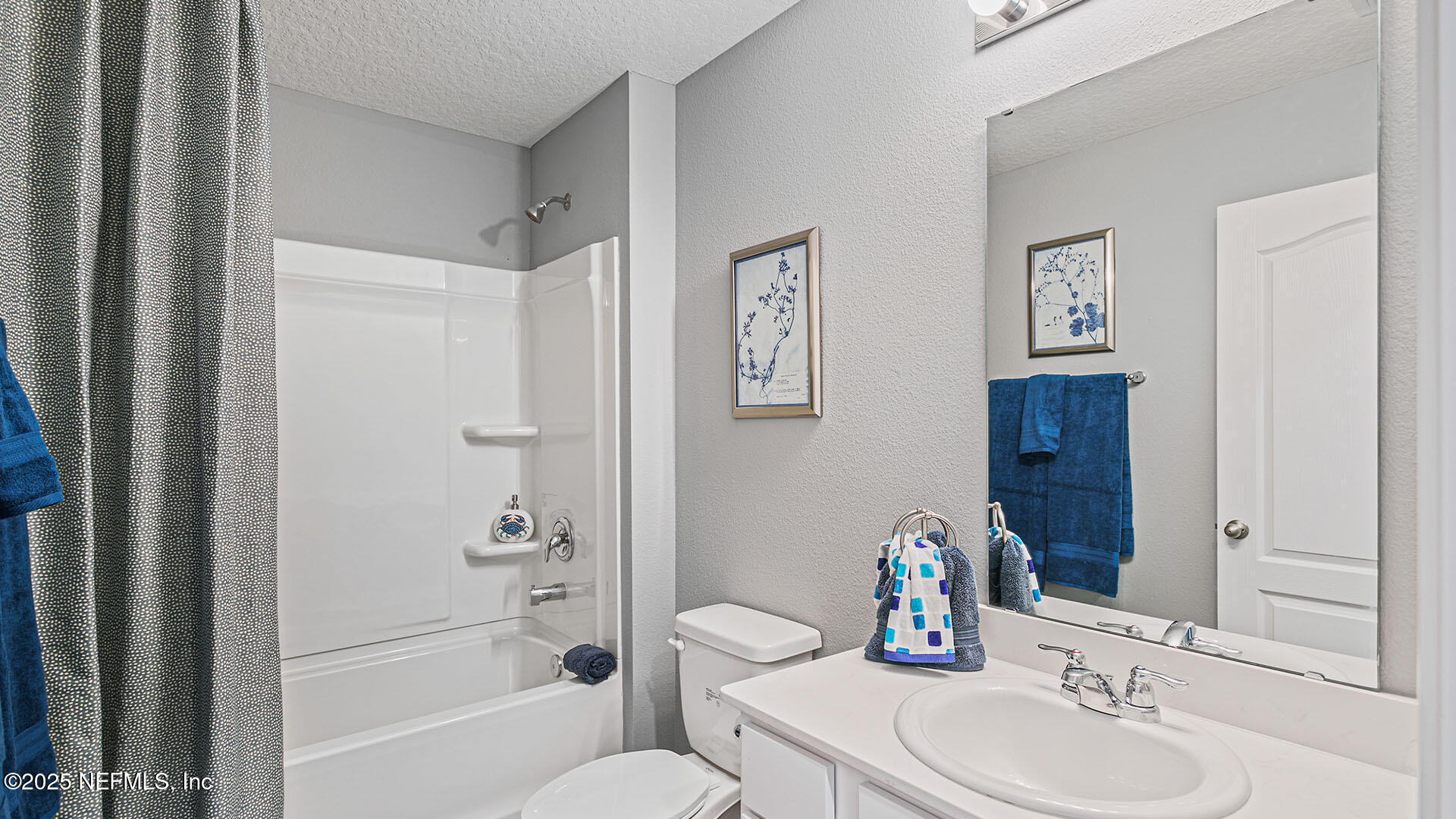 31 Palm Lane Palm Coast, FL 32164 - Photo 20 of 34 a bathroom with a sink toilet and shower