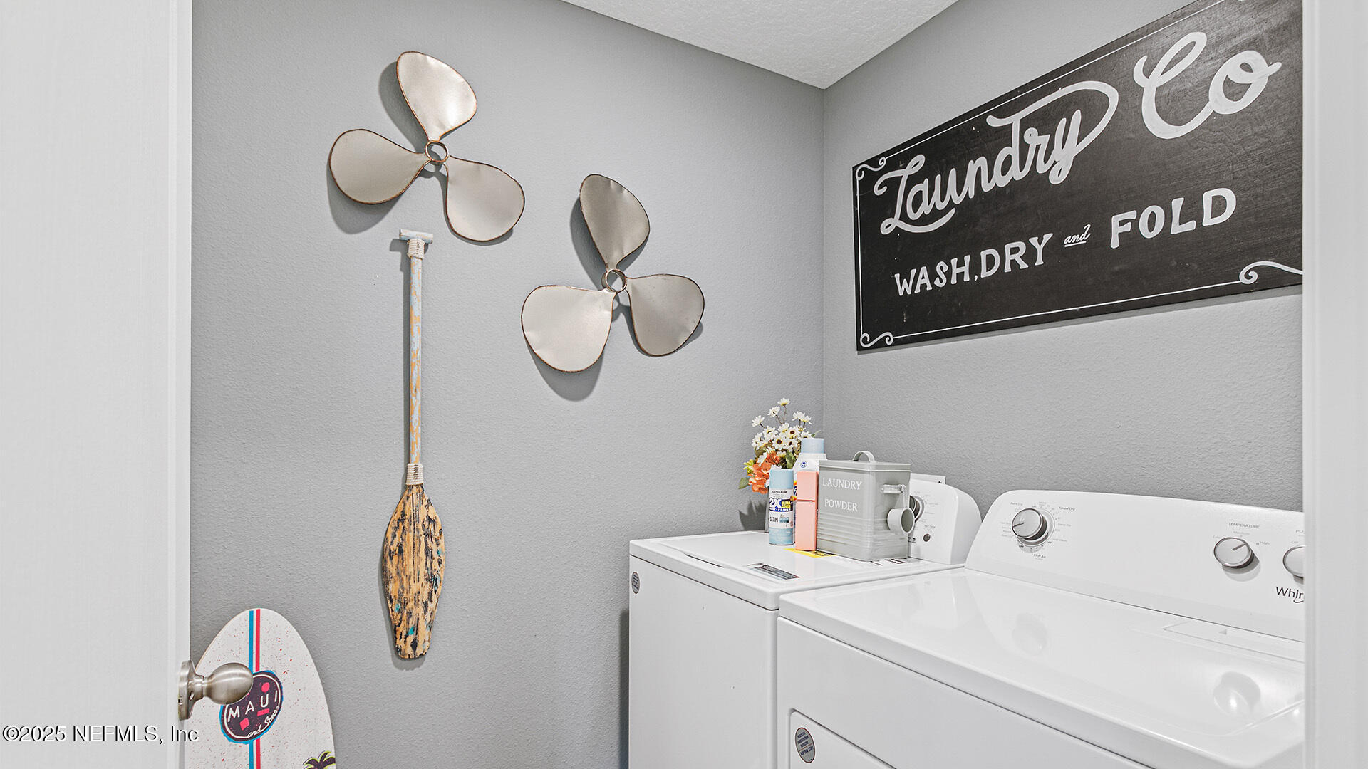 31 Palm Lane Palm Coast, FL 32164 - Photo 23 of 34 a utility room with a baby crib and a window