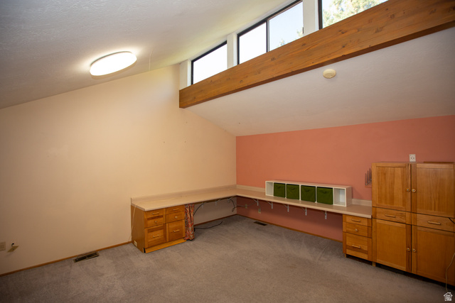 1500 Sumac Drive Logan, UT 84321 - Photo 26 of 42 Vaulted ceiling with clerestory windows and exposed wood beam