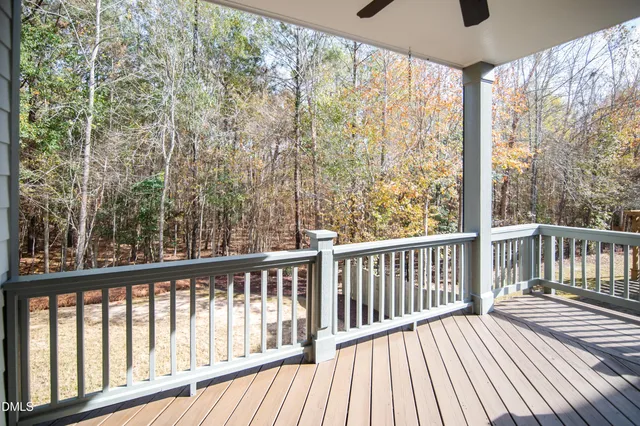 a view of balcony with wooden floor