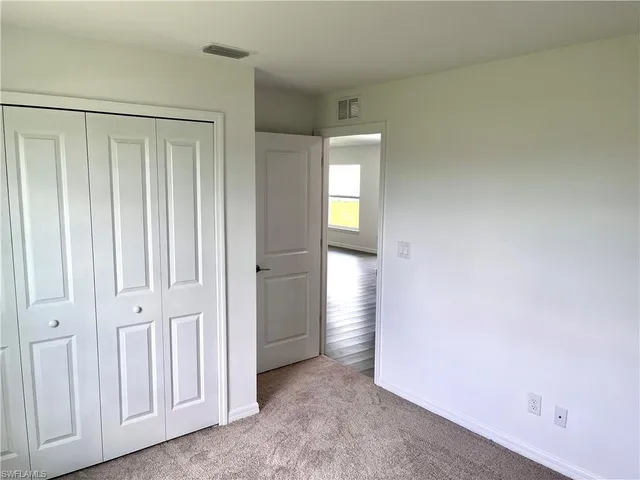 a bathroom with a toilet a sink and bathtub