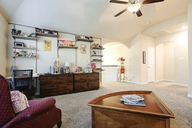a living room with furniture and window