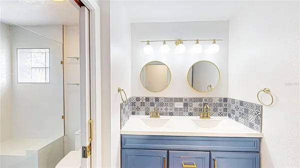 a sink with a mirror