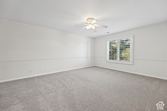 10664 Trail Ridge Circle Sandy, UT 84092 - Photo 39 of 113 Recessed lighting, ceiling fan, carpeting, window with plantation shutters, and chair rail molding