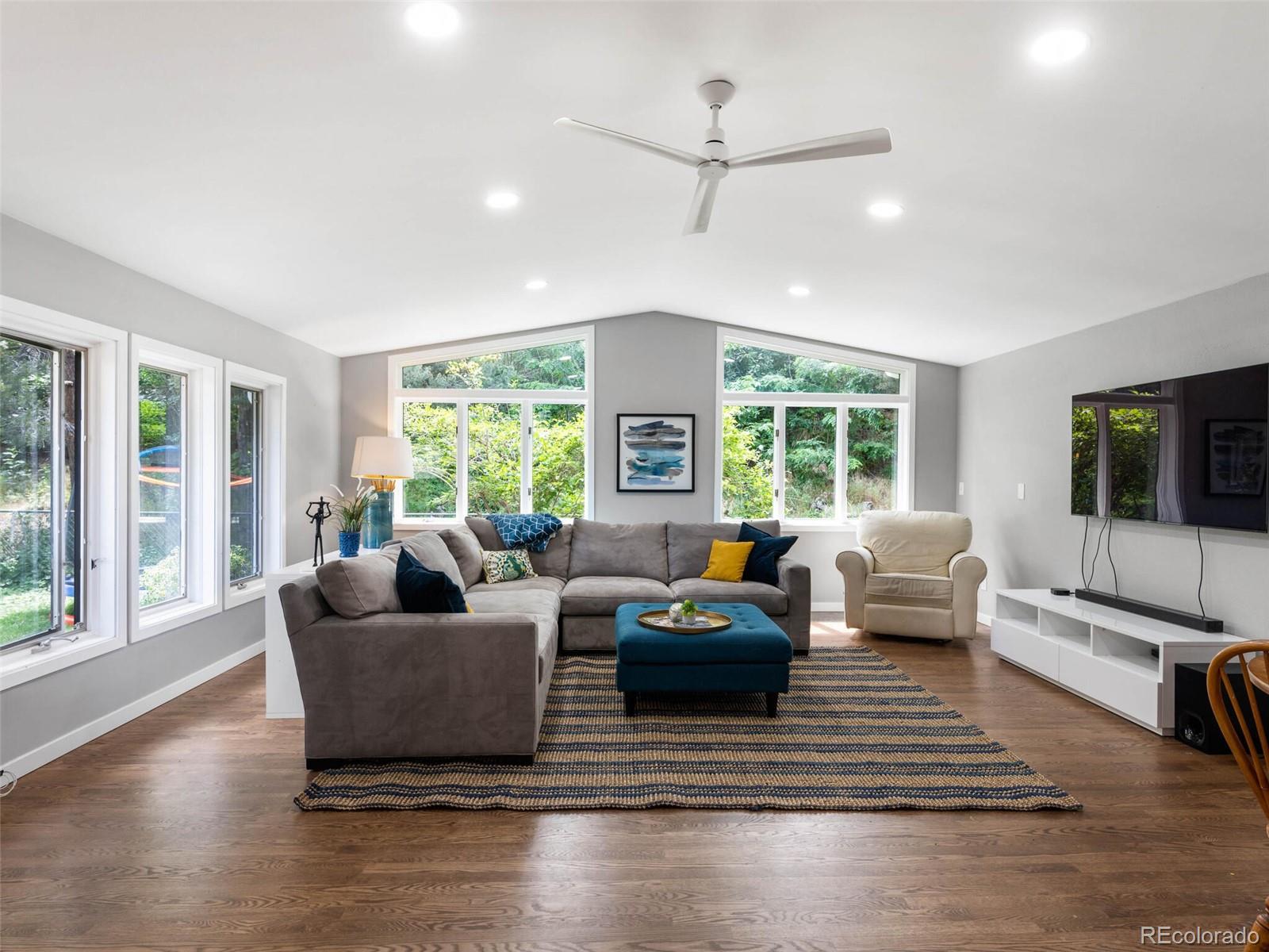 1826 Smith Road Golden, CO 80401 - Photo 14 of 35 a living room with furniture and a large window