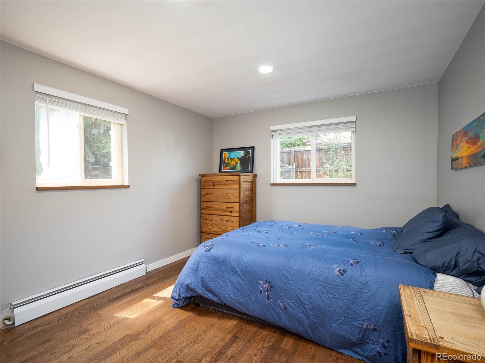 1826 Smith Road Golden, CO 80401 - Photo 28 of 35 a bedroom with a bed and a window