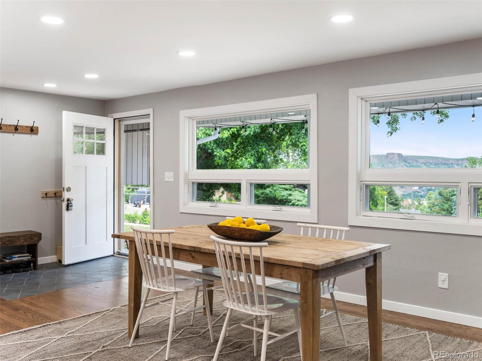 1826 Smith Road Golden, CO 80401 - Photo 7 of 35 a dining room with furniture and window