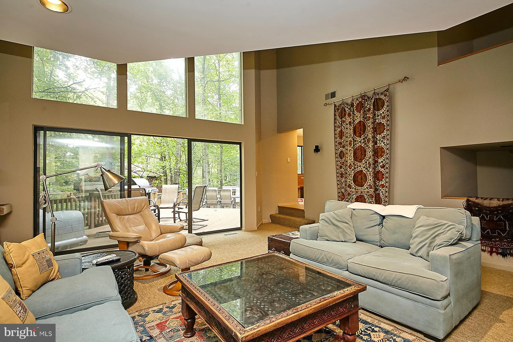 2265 Compass Point Lane Reston, VA 20191 - Photo 12 of 30 a living room with furniture and a large window