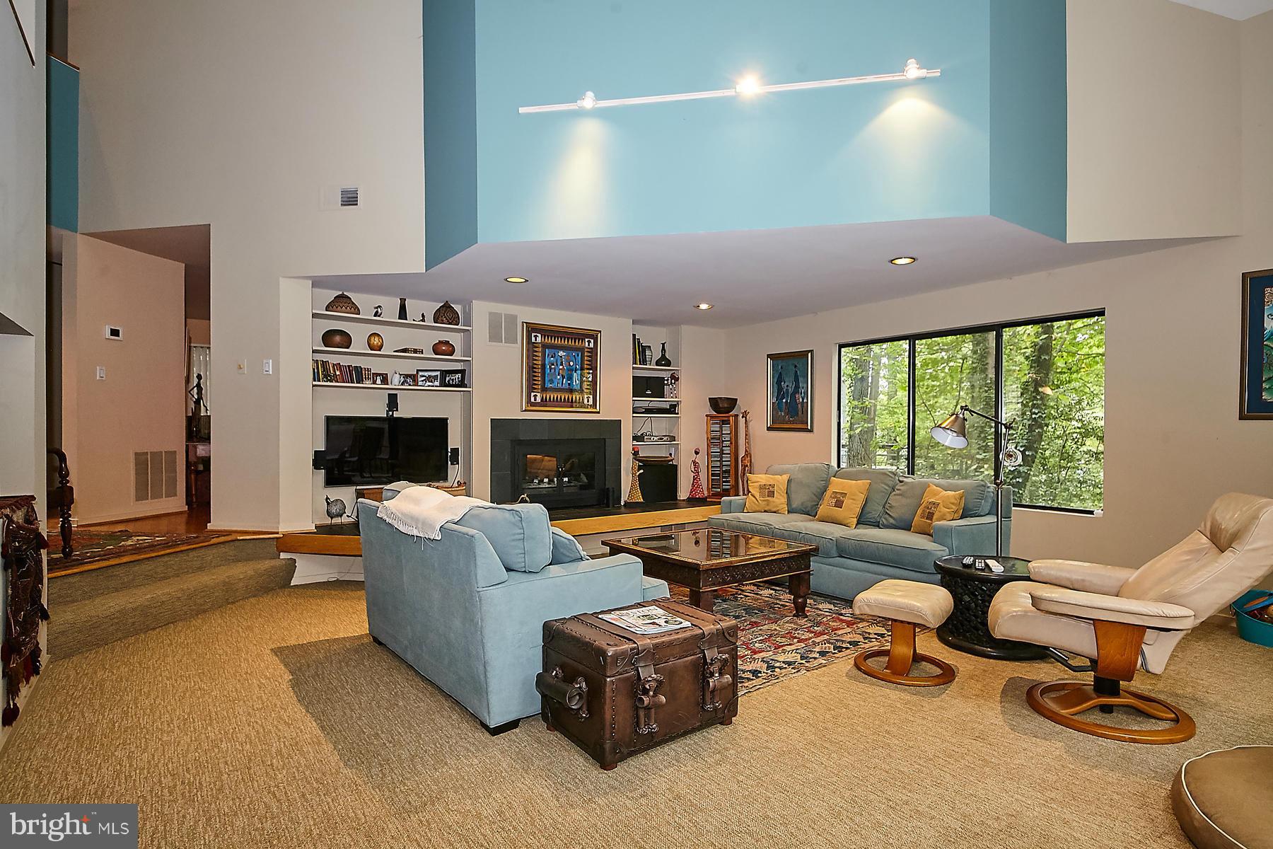 2265 Compass Point Lane Reston, VA 20191 - Photo 13 of 30 a living room with furniture and a fireplace