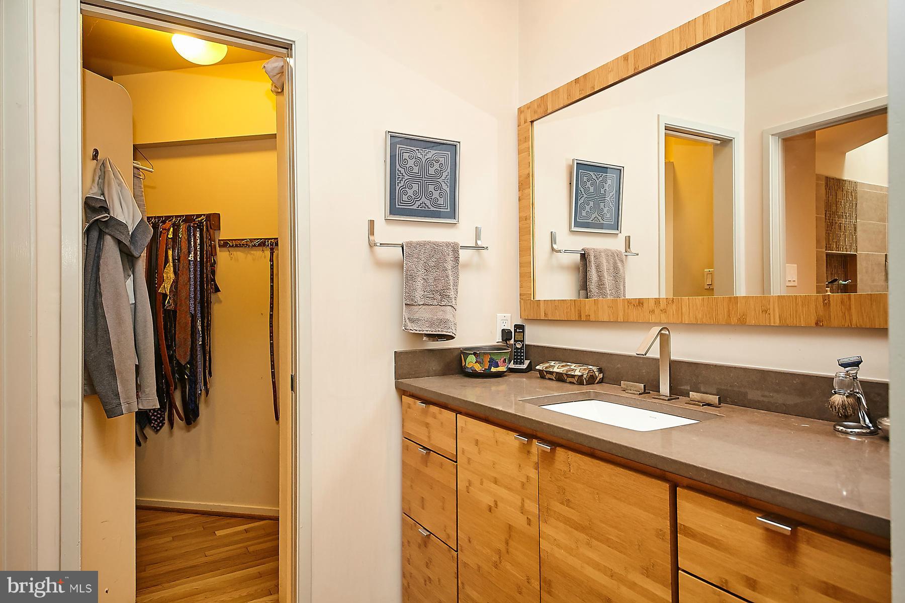 2265 Compass Point Lane Reston, VA 20191 - Photo 17 of 30 a bathroom with a sink and a mirror