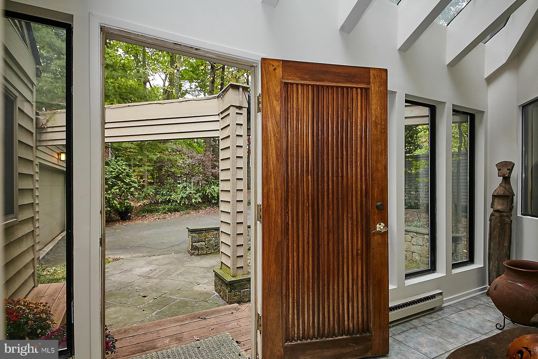 2265 Compass Point Lane Reston, VA 20191 - Photo 3 of 30 a view of a porch with a door and wooden floor
