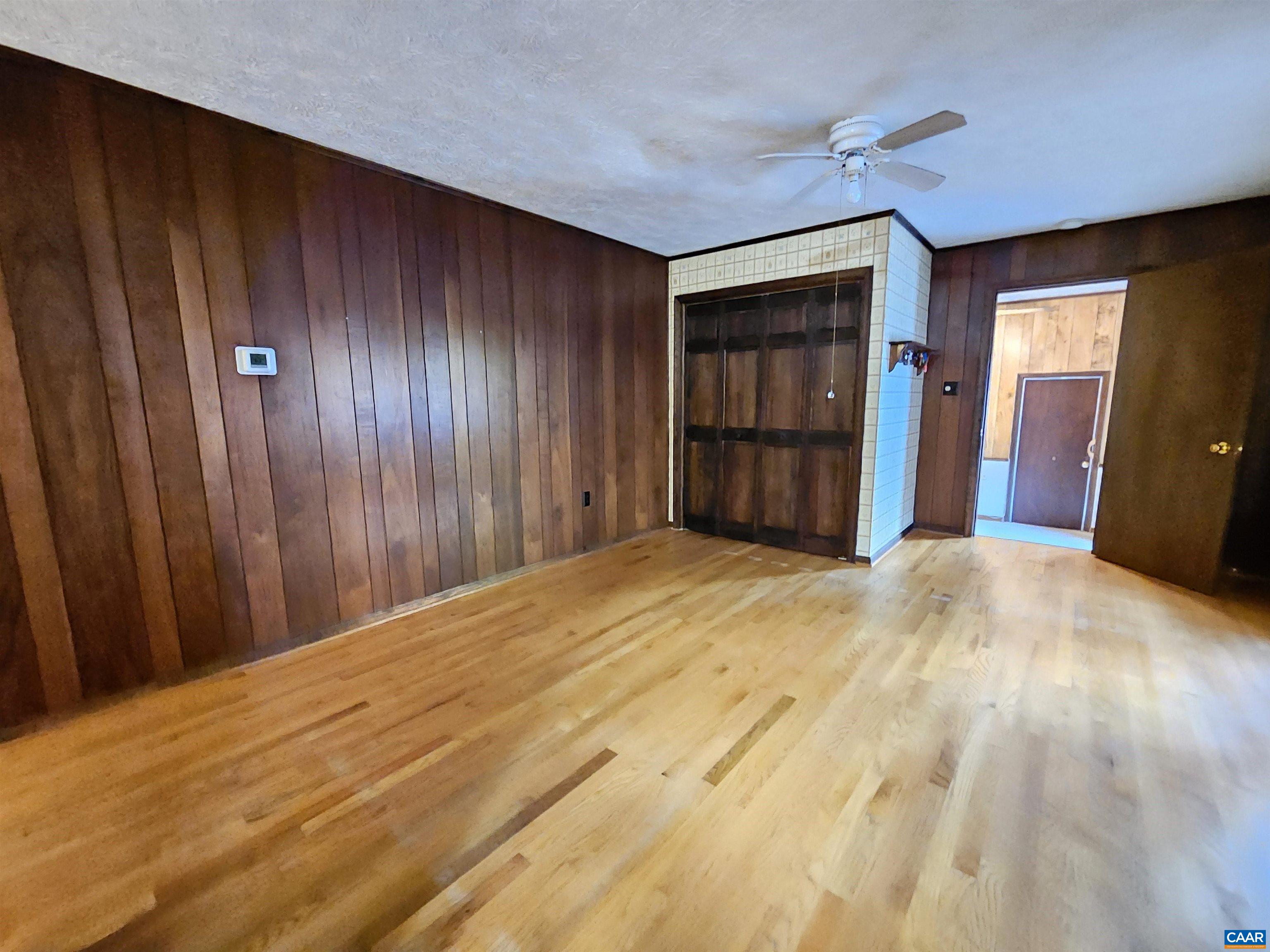 226 Fanny White Road Buckingham, VA 23921 - Photo 11 of 29 a view of a livingroom with wooden floor and closet