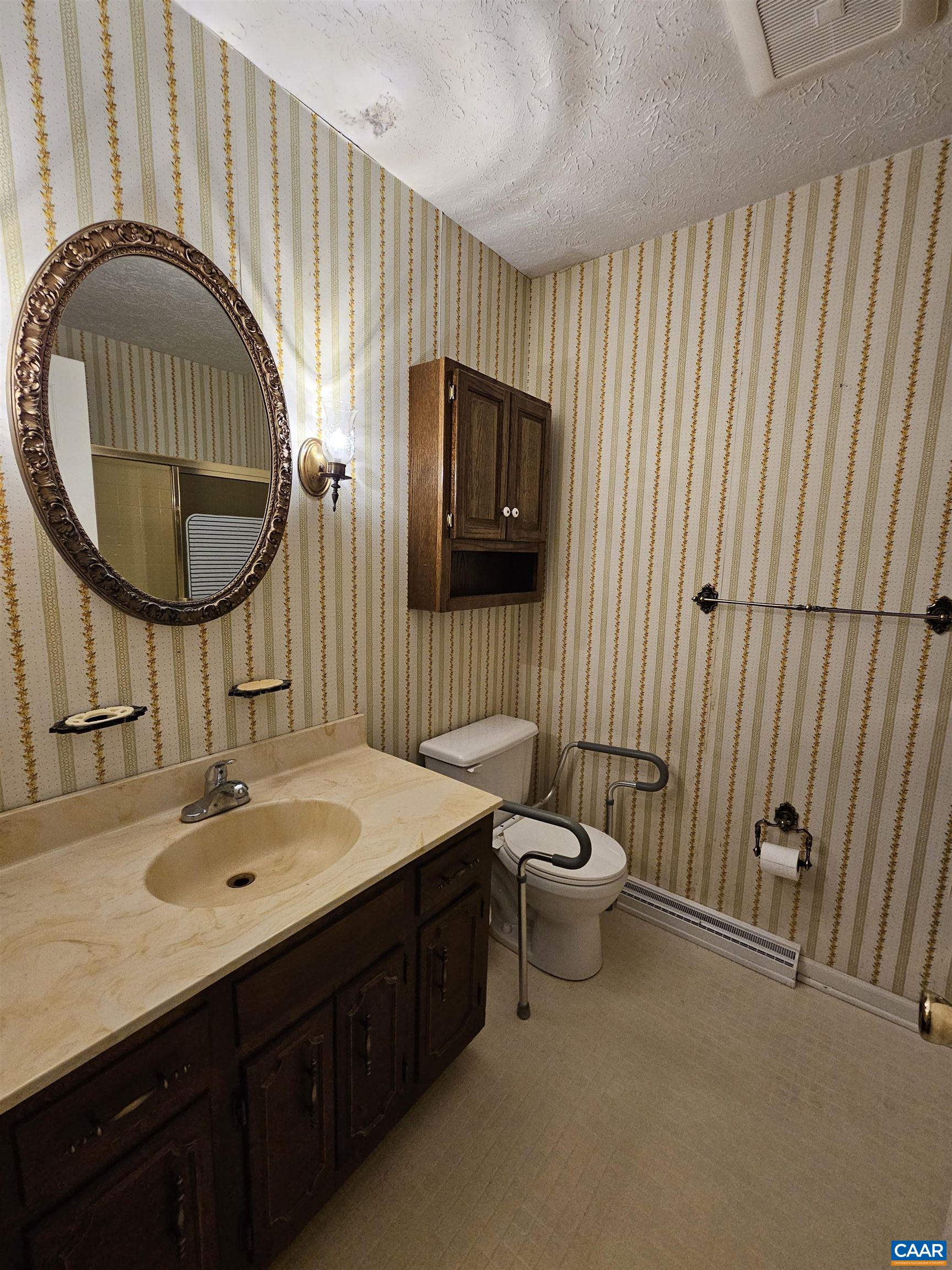 226 Fanny White Road Buckingham, VA 23921 - Photo 15 of 29 a bathroom with a sink and a mirror