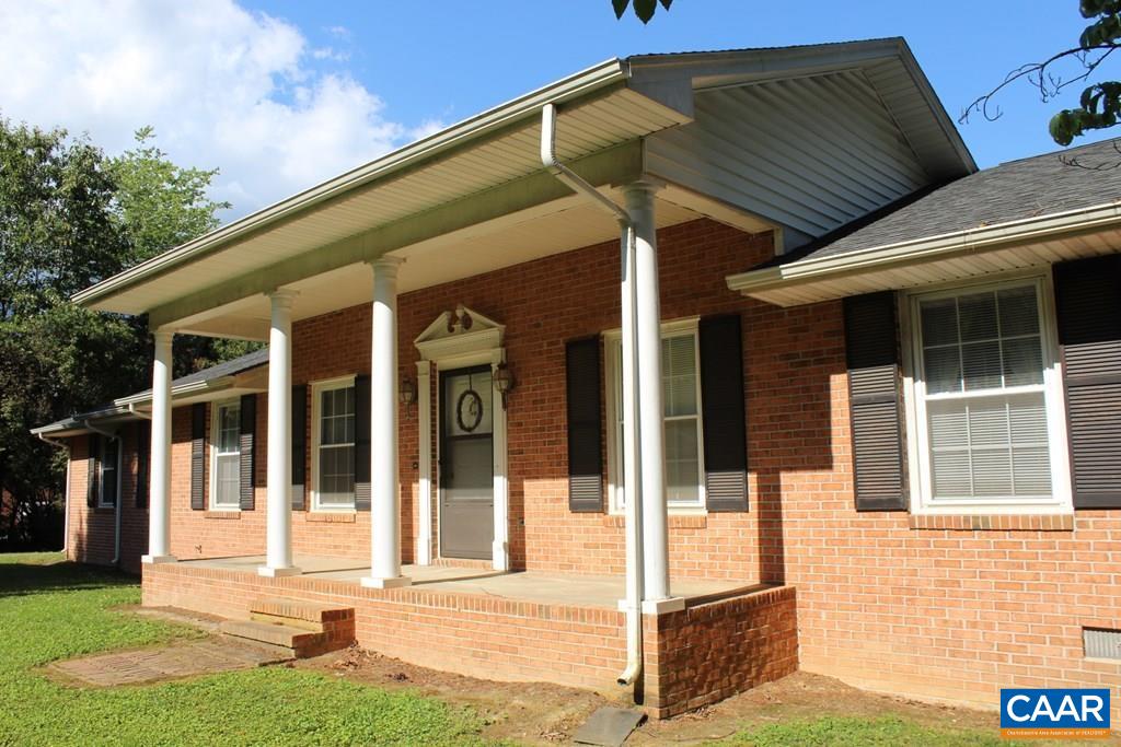 226 Fanny White Road Buckingham, VA 23921 - Photo 2 of 29 a front view of a house with a yard