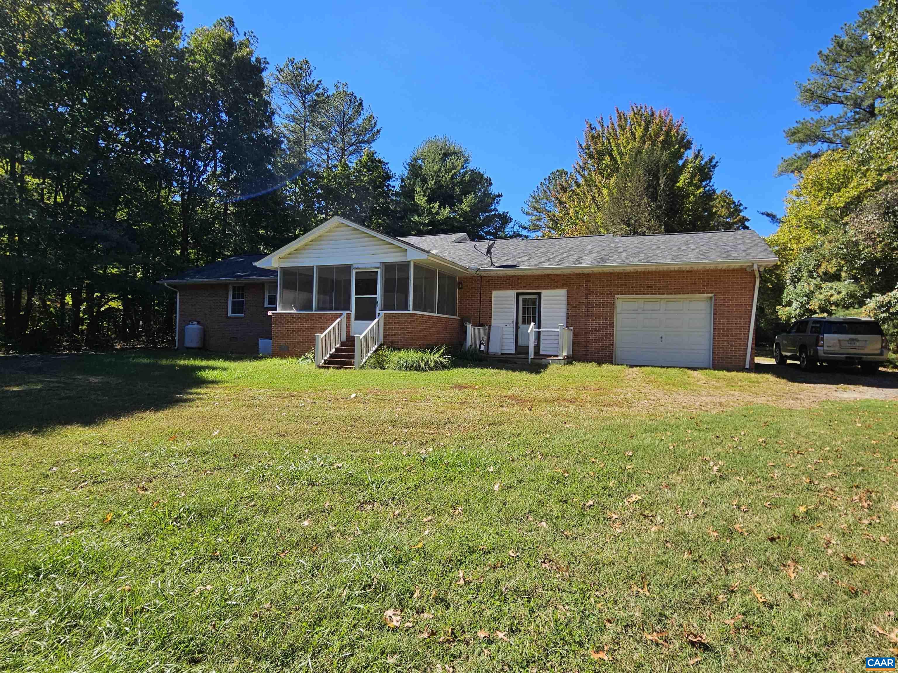 226 Fanny White Road Buckingham, VA 23921 - Photo 23 of 29 a front view of a house with yard and green space