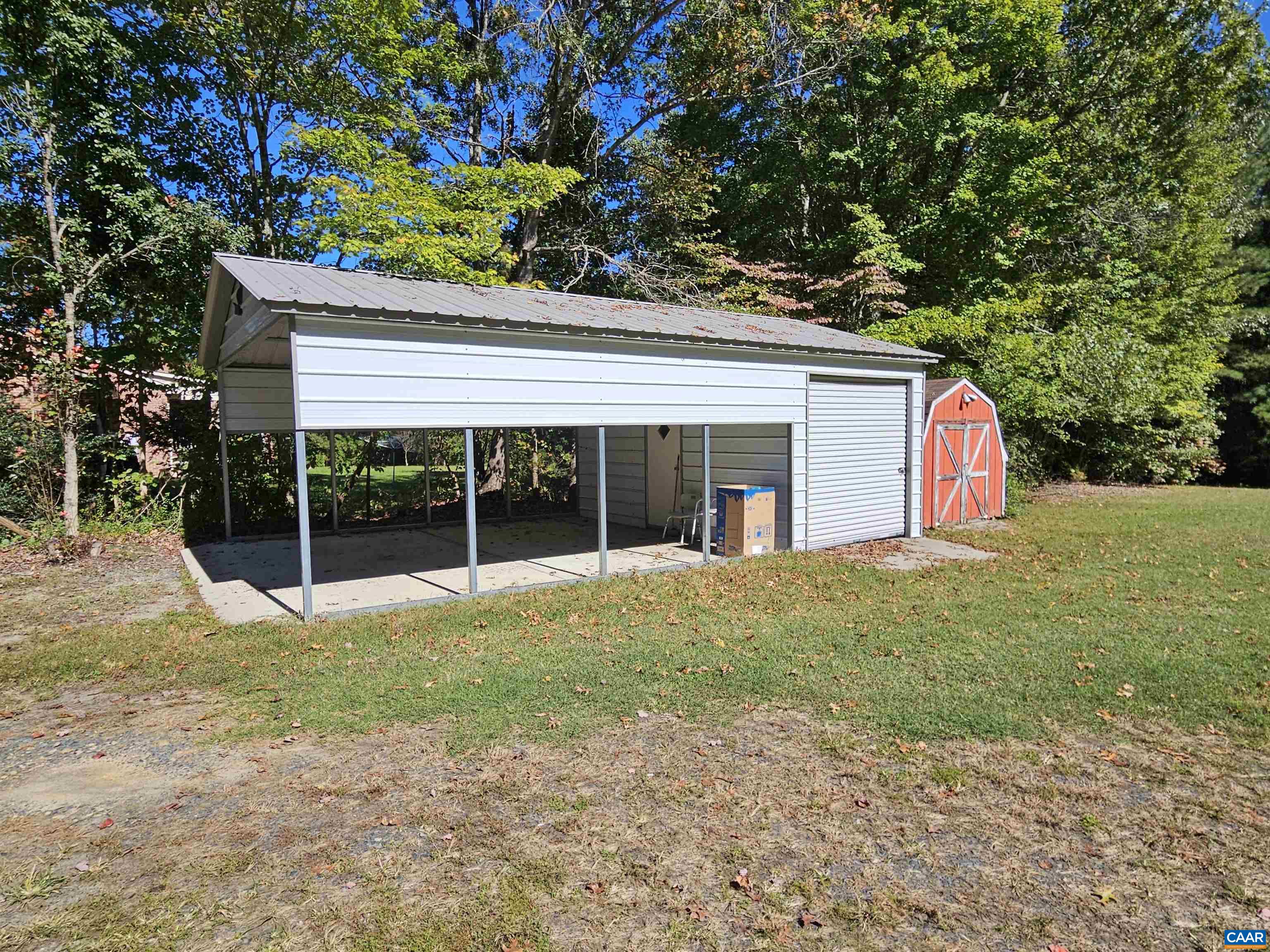 226 Fanny White Road Buckingham, VA 23921 - Photo 26 of 29 a view of a house with a backyard and a tree