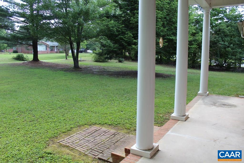 226 Fanny White Road Buckingham, VA 23921 - Photo 3 of 29 a view of a yard with a tree