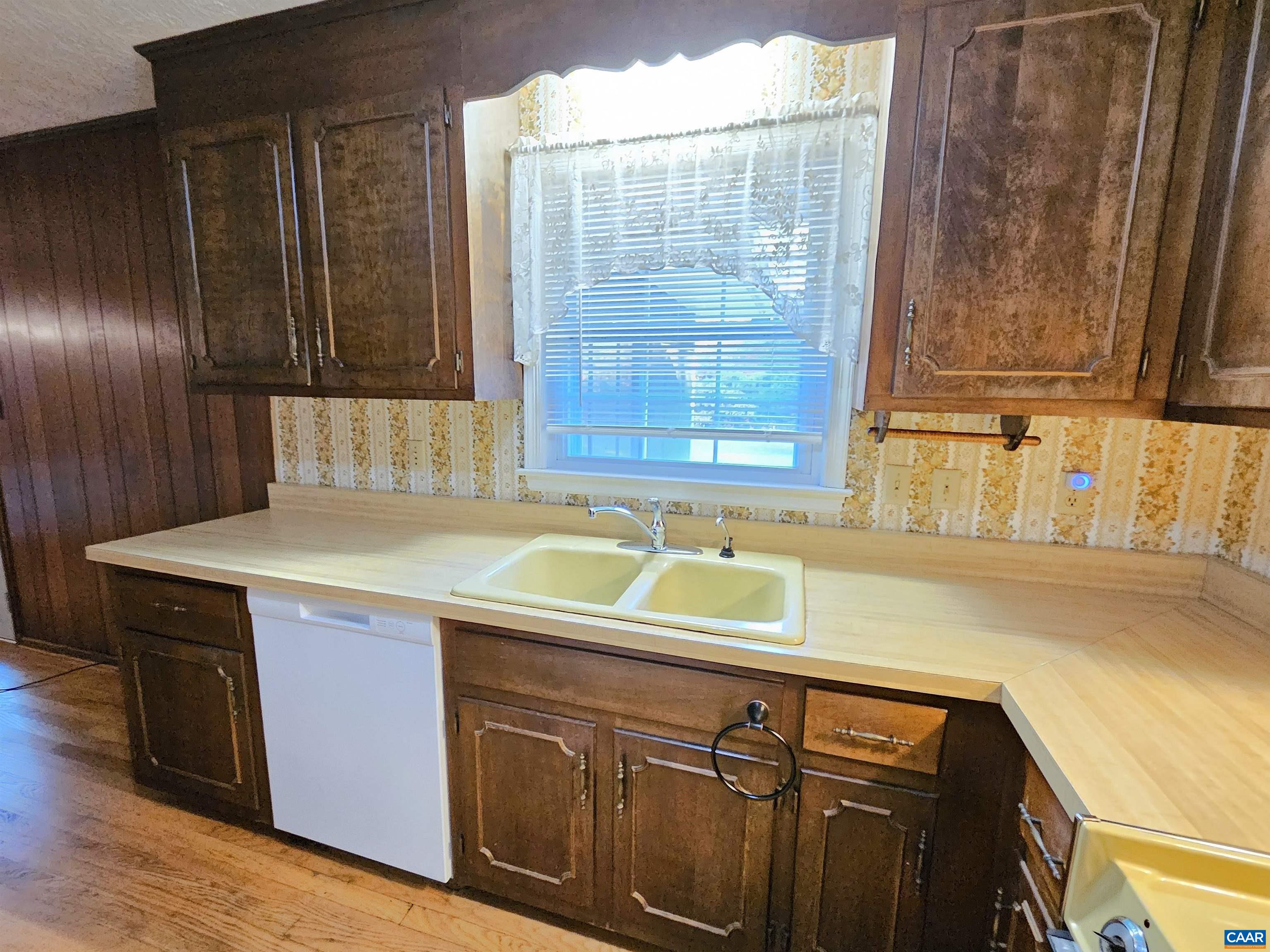 226 Fanny White Road Buckingham, VA 23921 - Photo 10 of 29 a kitchen with a sink and a window