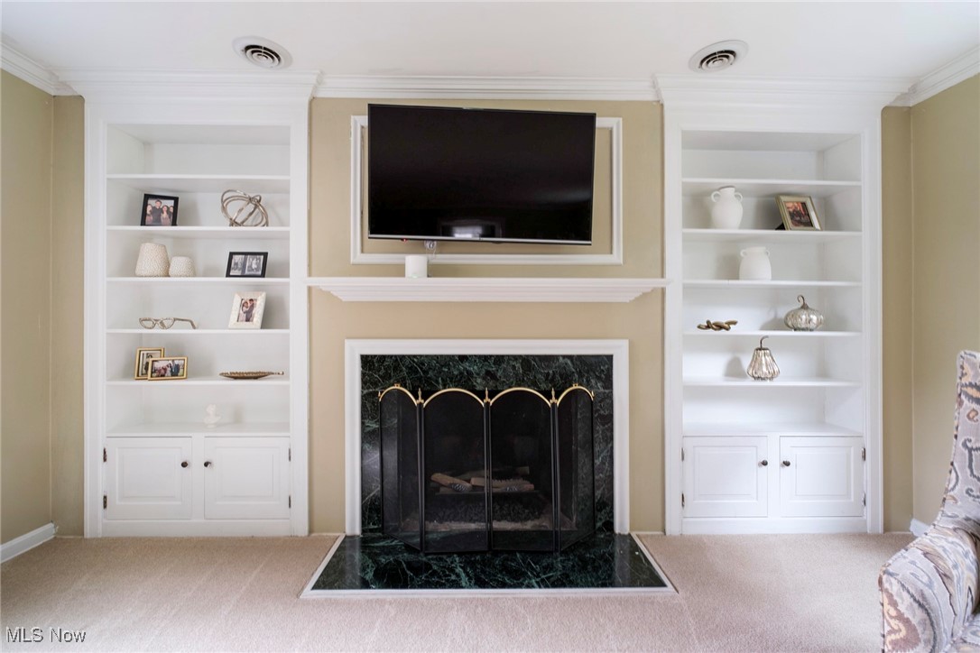 117 Overhill Road Youngstown, OH 44512 - Photo 5 of 49 Living room fireplace and built in bookshelves