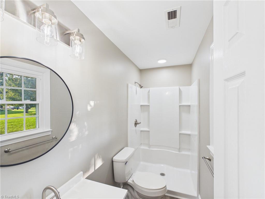3799 Mack Lineberry Road Franklinville, NC 27248 - Photo 11 of 23 En-suite bathroom for second bedroom