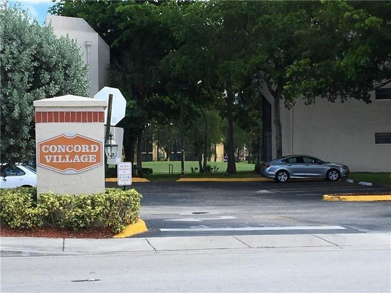7950 West McNab Road, Unit 104 Tamarac, FL 33321 - Photo 1 of 15 Photo 1