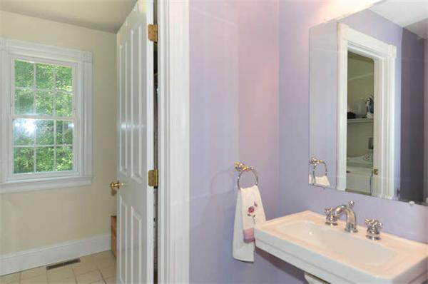 10 Oregon Road Ashland, MA 01721 - Photo 15 of 28 a bathroom with a sink and a mirror