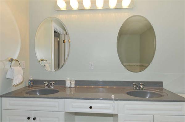 10 Oregon Road Ashland, MA 01721 - Photo 18 of 28 a bathroom with a sink and a mirror