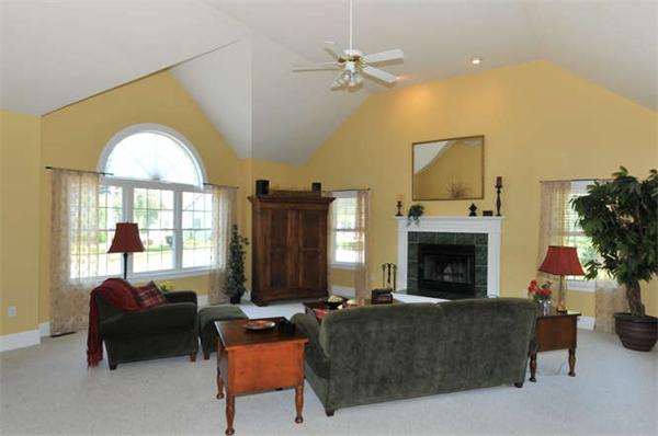 10 Oregon Road Ashland, MA 01721 - Photo 5 of 28 a living room with furniture and a fireplace