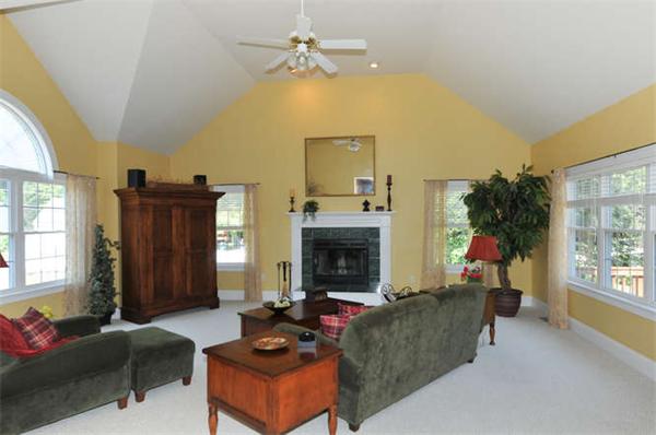 10 Oregon Road Ashland, MA 01721 - Photo 6 of 28 a living room with furniture and a fireplace