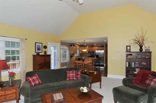 10 Oregon Road Ashland, MA 01721 - Photo 8 of 28 a living room with furniture and a floor to ceiling window