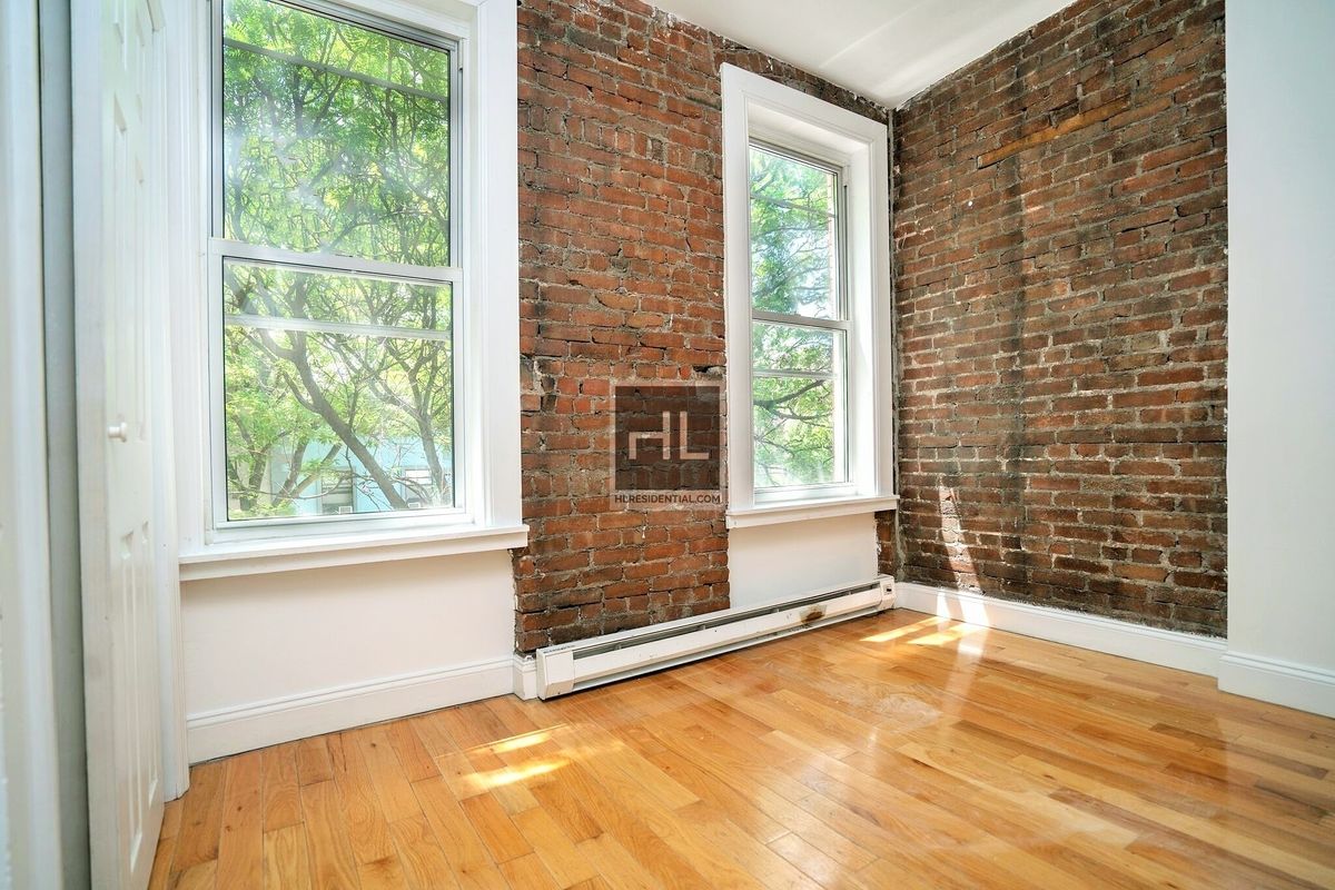 21 Adelphi Street, Unit 3R Brooklyn, NY 11205 - Photo 3 of 16 a view of a room with a large window