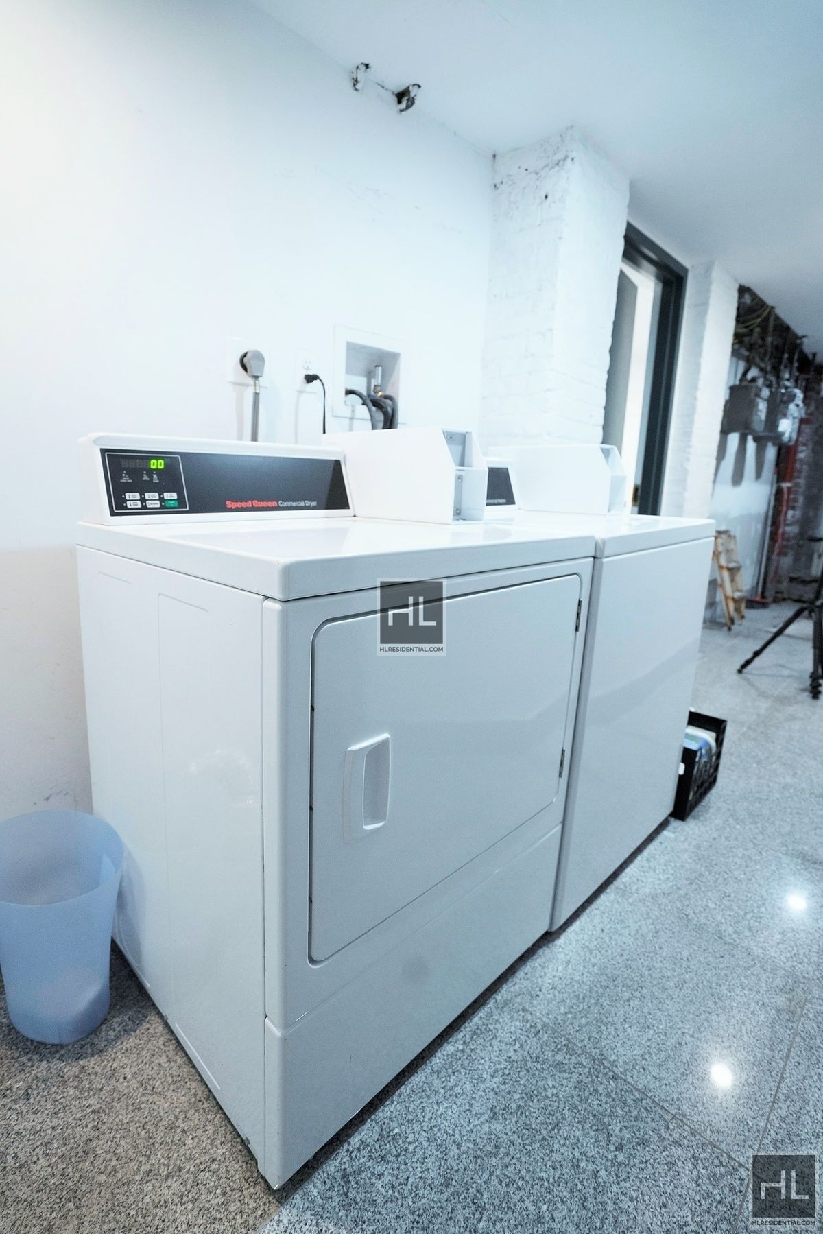 21 Adelphi Street, Unit 3R Brooklyn, NY 11205 - Photo 10 of 16 a utility room with dryer and washer