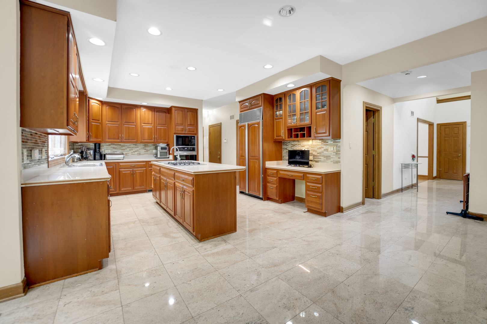 1816 Princeton Road Flossmoor, IL 60422 - Photo 5 of 26 a large kitchen with cabinets and a counter top space