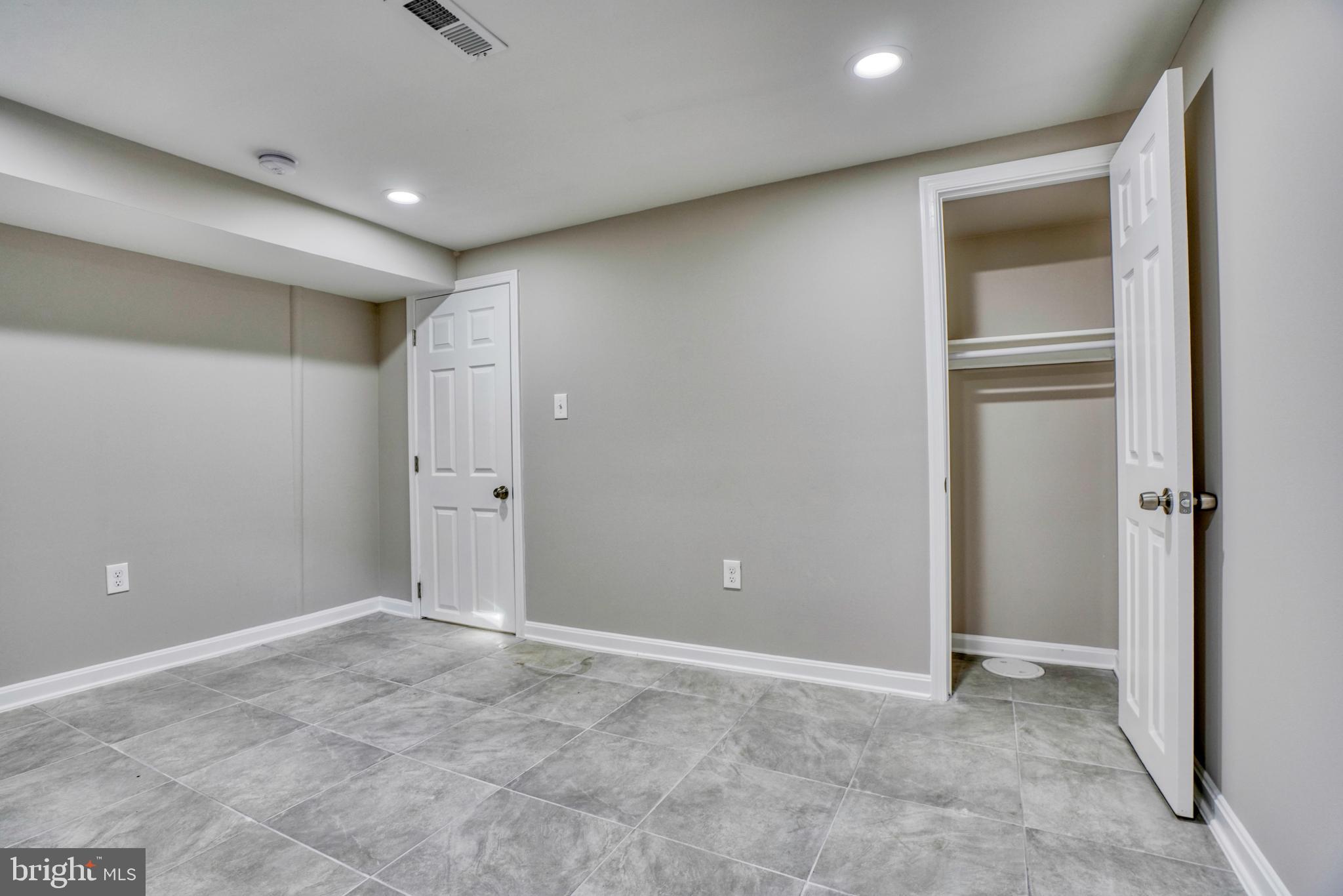5309 Catalpha Road Baltimore, MD 21214 - Photo 19 of 45 Lower Level Family Room