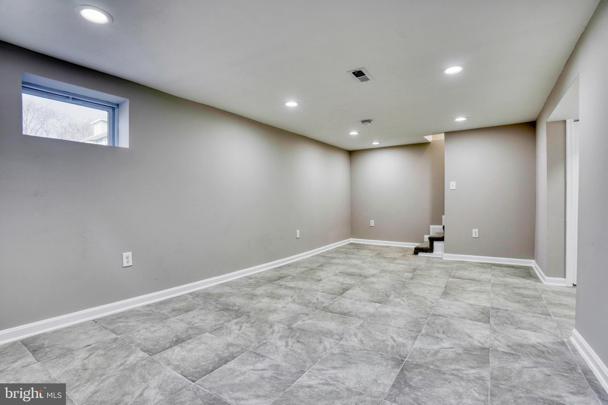 5309 Catalpha Road Baltimore, MD 21214 - Photo 20 of 45 Lower Level Family Room