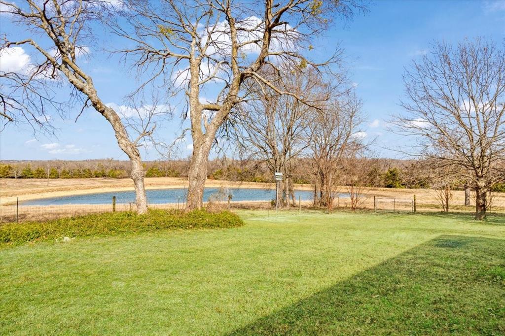 1044 County Road 3230 Windom, TX 75492 - Photo 19 of 40 a swimming pool with an outdoor space and seating