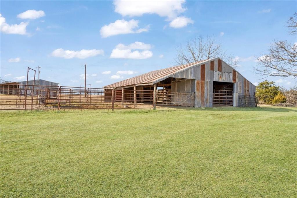 1044 County Road 3230 Windom, TX 75492 - Photo 22 of 40 a view of a house with a backyard