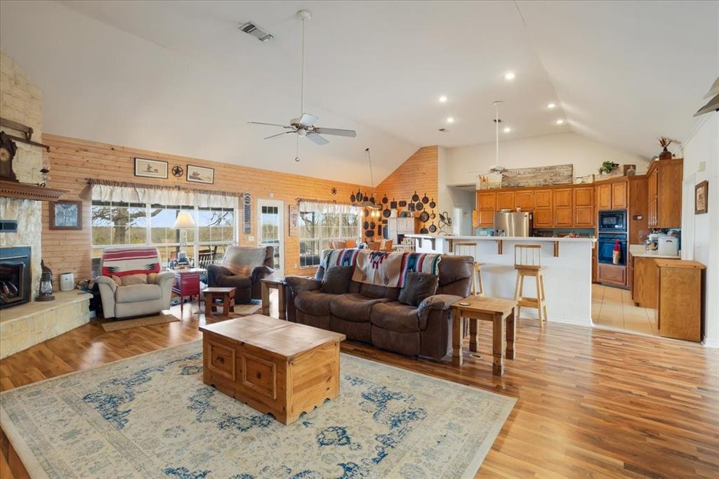 1044 County Road 3230 Windom, TX 75492 - Photo 4 of 40 a living room with furniture kitchen view and a large window