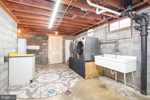 a utility room with dryer and washer