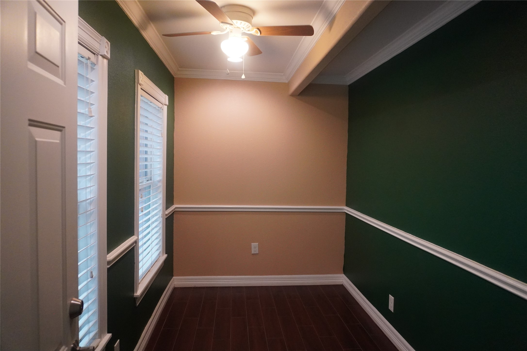 7506 Dearborn Street Houston, TX 77055 - Photo 8 of 15 a view of an empty room with wooden floor and a window