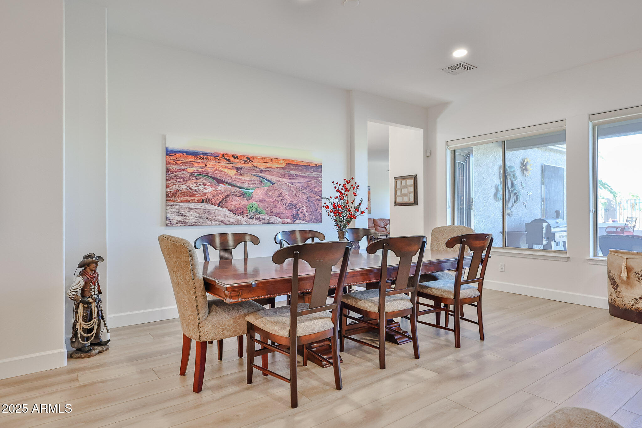13458 West Coronado Road Goodyear, AZ 85395 - Photo 12 of 68 Dining looks out to patio & golf