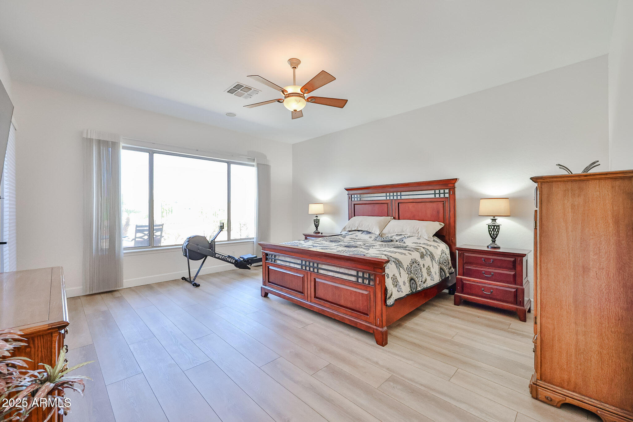 13458 West Coronado Road Goodyear, AZ 85395 - Photo 35 of 68 Primary bedroom with view of golf course