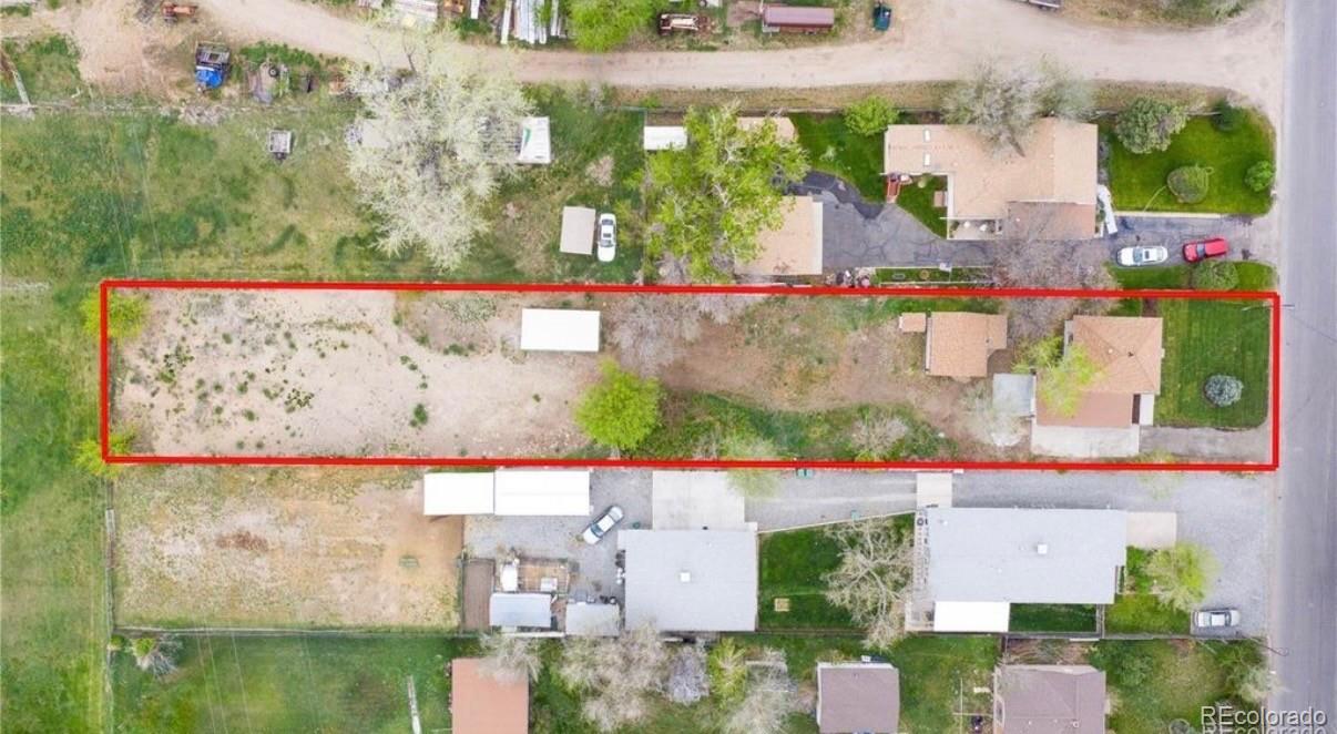 4695 Parfet Street Wheat Ridge, CO 80033 - Photo 11 of 46 an aerial view of houses with outdoor space