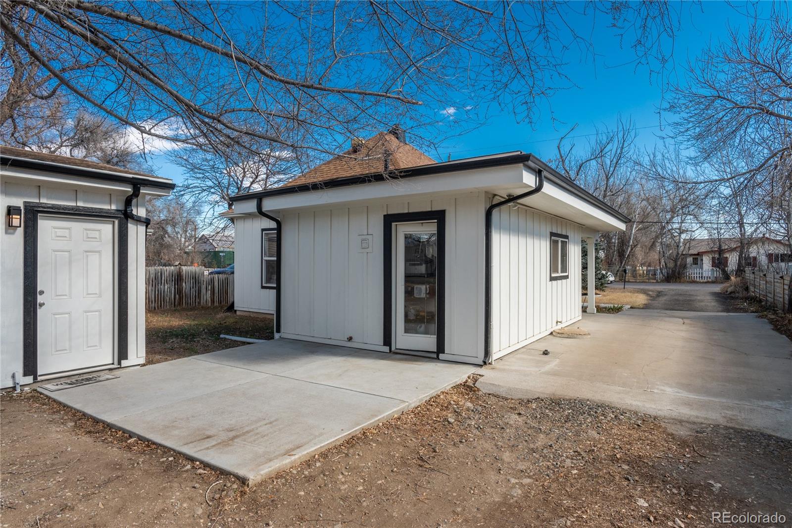 4695 Parfet Street Wheat Ridge, CO 80033 - Photo 45 of 46 a view of a house with a patio