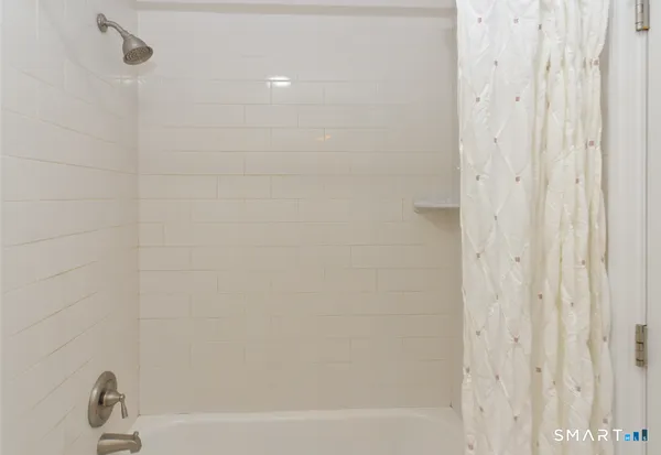 a bathroom with a bathtub